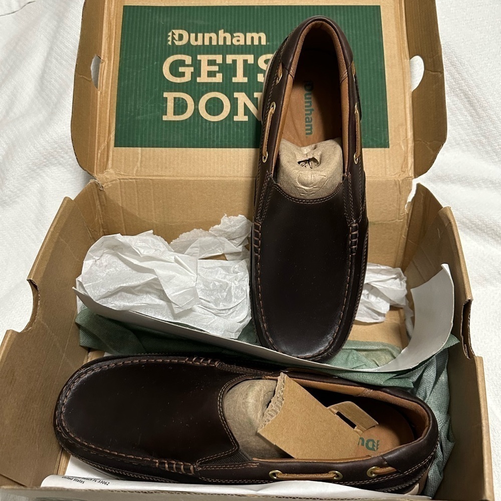 Men’s Dunham slip on shoes. Never worn - size 10W. Dark brown.